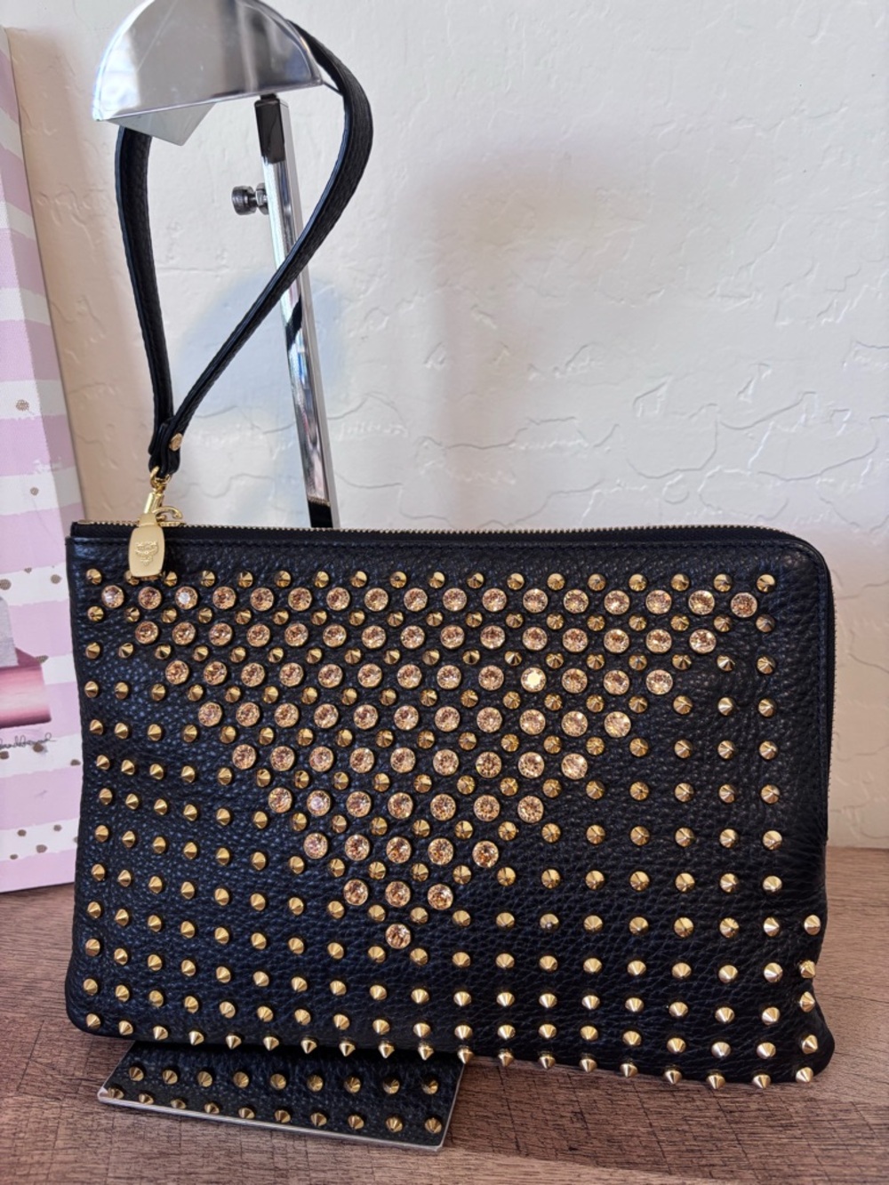 MCM Gold Studded Black Wristlet Clutch 
Crossbody with Gold Accents